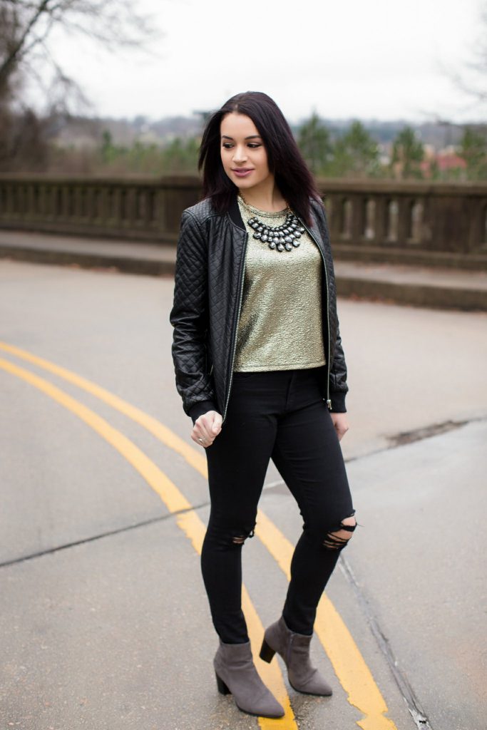 gold top leather jacket distressed black jeans