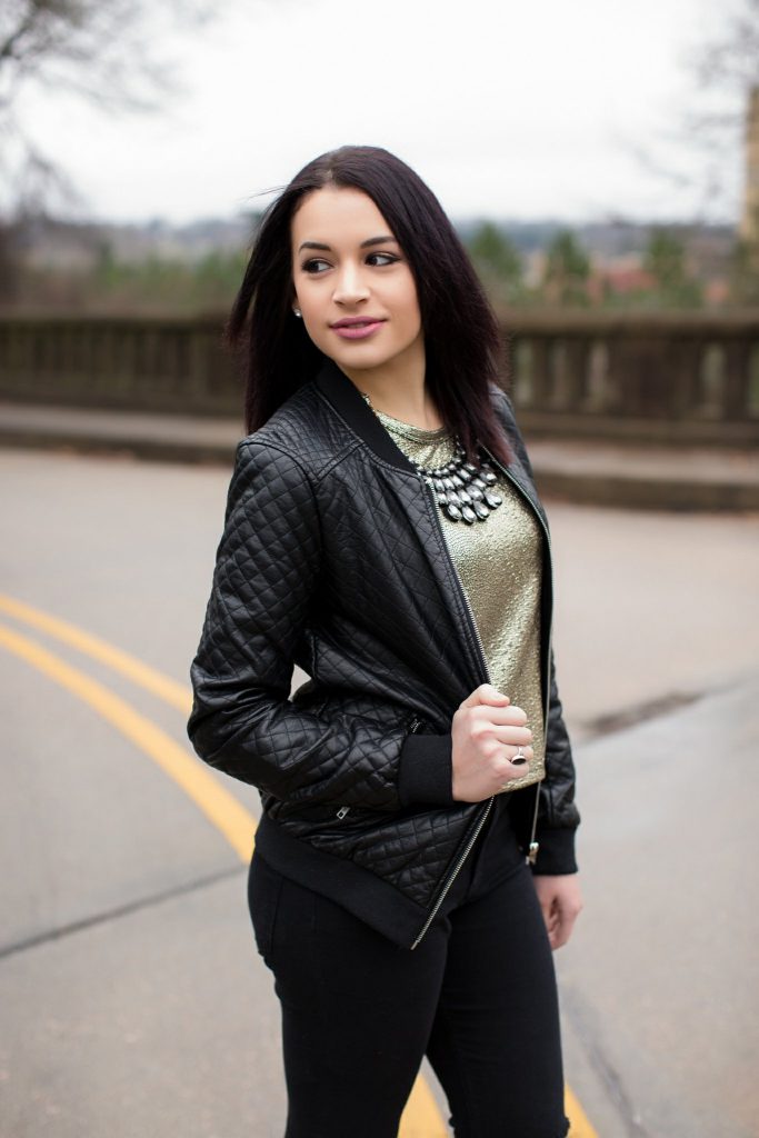 gold top leather jacket distressed black jeans