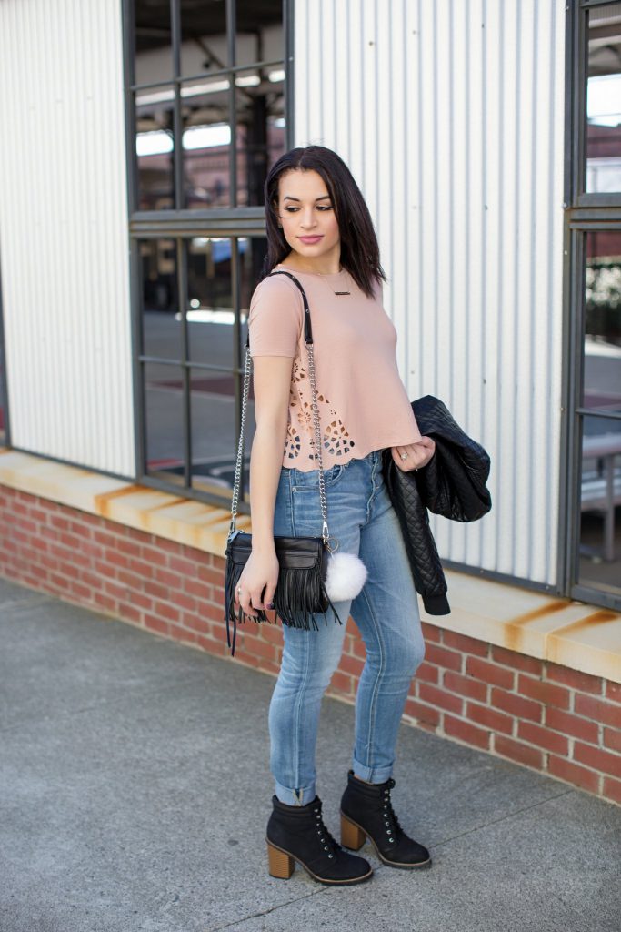 forever 21 leather jacket, forever 21 blush crop top, laser cut top, rebecca minkoff mini mac, rebecca minkoff fringe bag, express high waisted light wash jeggings, black heeled boots, how to style leather in the spring, how to wear a leather jacket in the spring