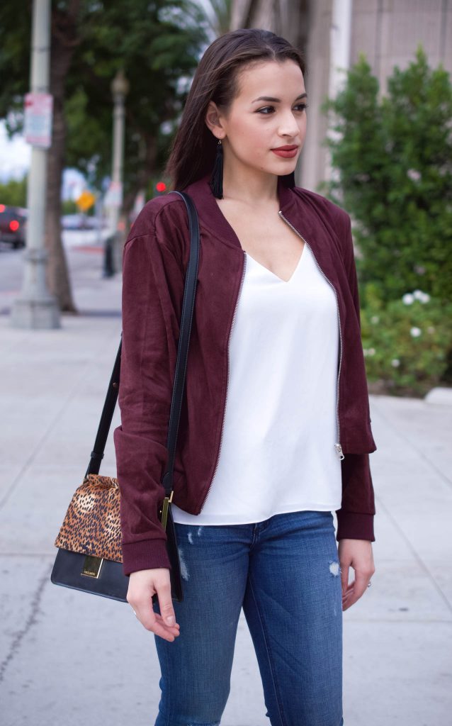 forever 21 jacket, bomber jacket and jeans, bomber jacket, affordable bomber jacket, burgundy bomber jacket, distressed jeans, express jeans, DV booties, target booties, tan booties, vince camuto abril, vince camuto handbag, topshop cami, black tassel earrings, LA blogger, LA style