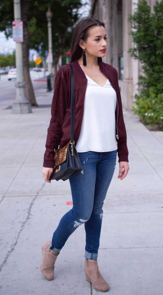 forever 21 jacket, bomber jacket and jeans, bomber jacket, affordable bomber jacket, burgundy bomber jacket, distressed jeans, express jeans, DV booties, target booties, tan booties, vince camuto abril, vince camuto handbag, topshop cami, black tassel earrings, LA blogger, LA style 