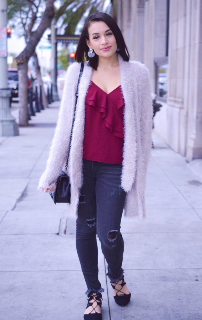 burgundy ruffle top, ruffle top, Valentine's day outfit, date night outfit, valentine's day lookbook, rebecca minkoff, frayed hem jeans, baublebar earrings