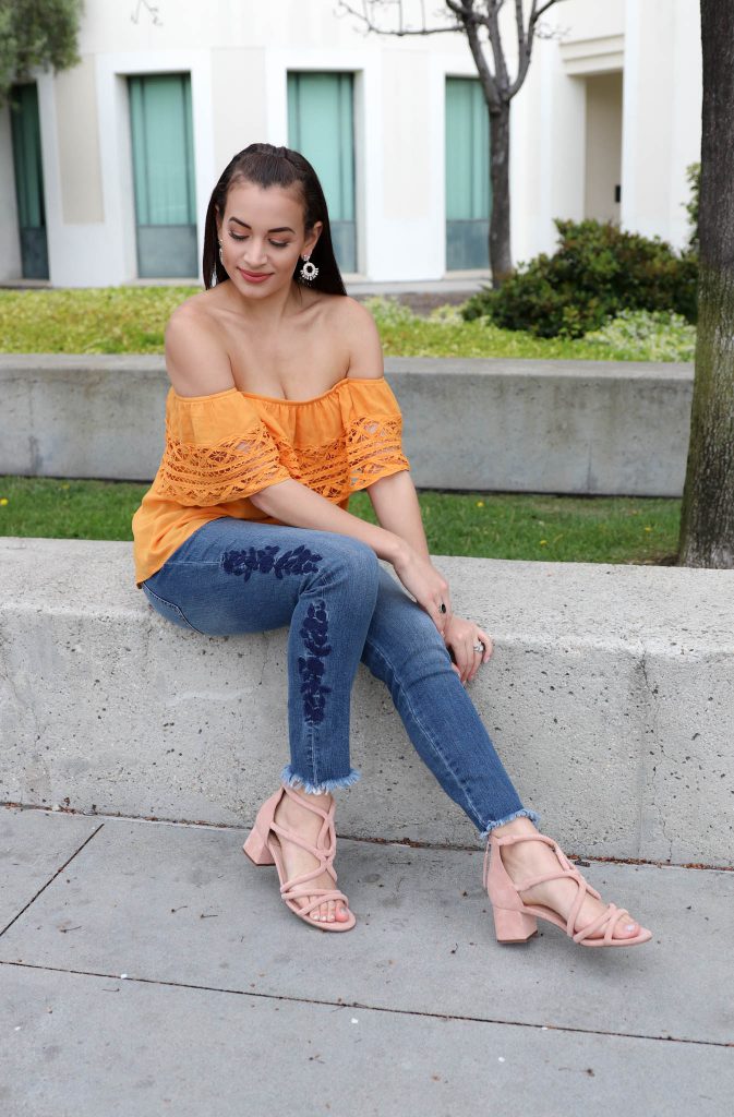 off the shoulder top, embroidered jeans